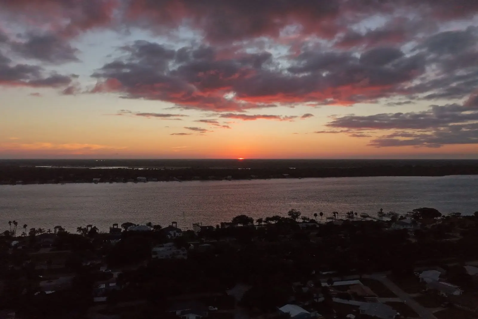 Red sky over the Halifax River, shot from Ormond Beach just up the river.